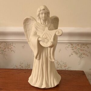 PartyLite bisque porcelain angel candle holder.